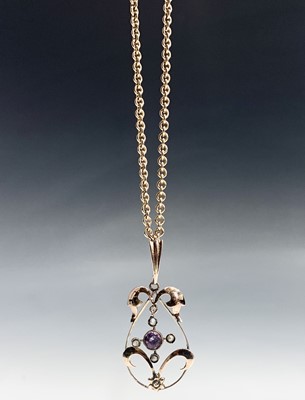 Lot 536 - A 9ct Art Nouveau pendant set with amethyst on...