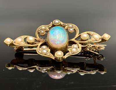 Lot 490 - A Victorian 15ct gold brooch with central oval...