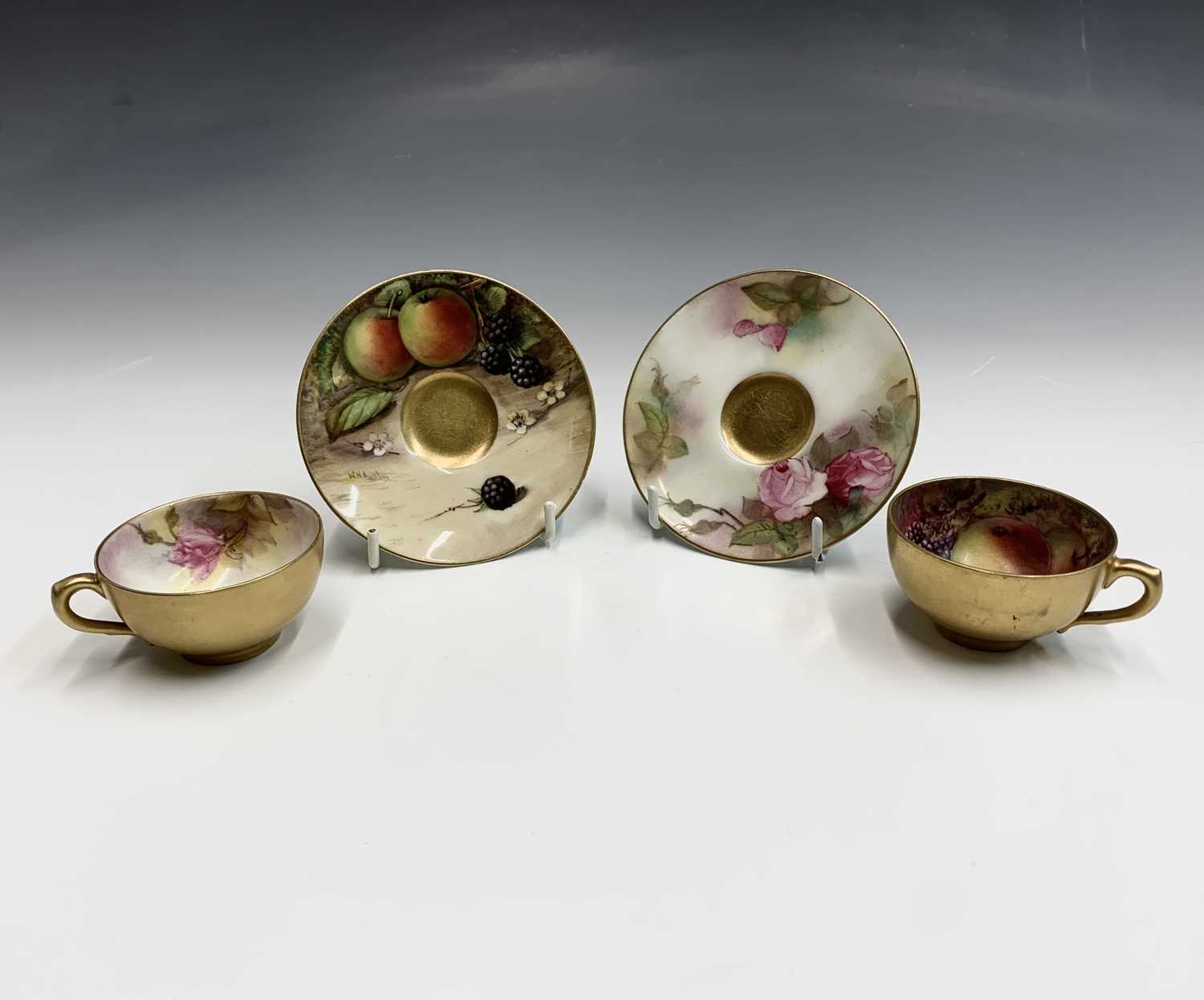 Lot 803 - A Royal Worcester fruit painted miniature cup...