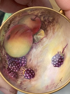 Lot 803 - A Royal Worcester fruit painted miniature cup...