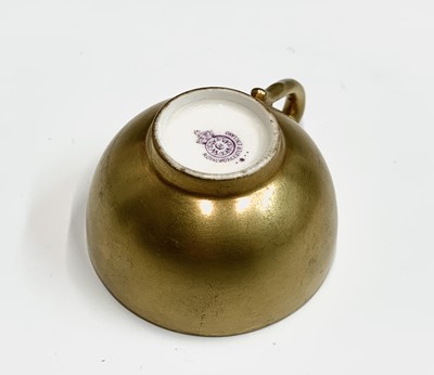 Lot 803 - A Royal Worcester fruit painted miniature cup...