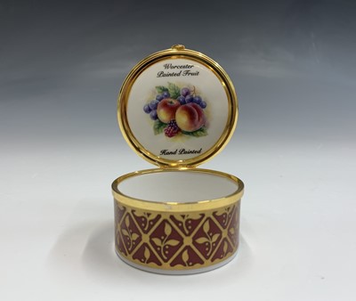 Lot 804 - A Royal Worcester fruit painted trinket box...