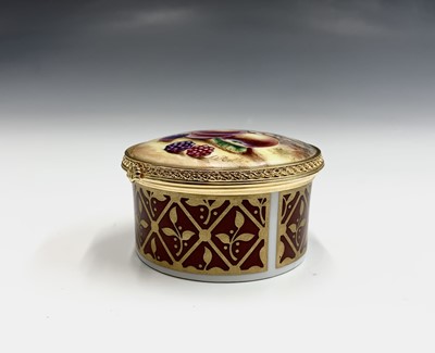 Lot 804 - A Royal Worcester fruit painted trinket box...