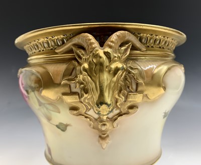 Lot 808 - A Royal Worcester blush ivory floral decorated...