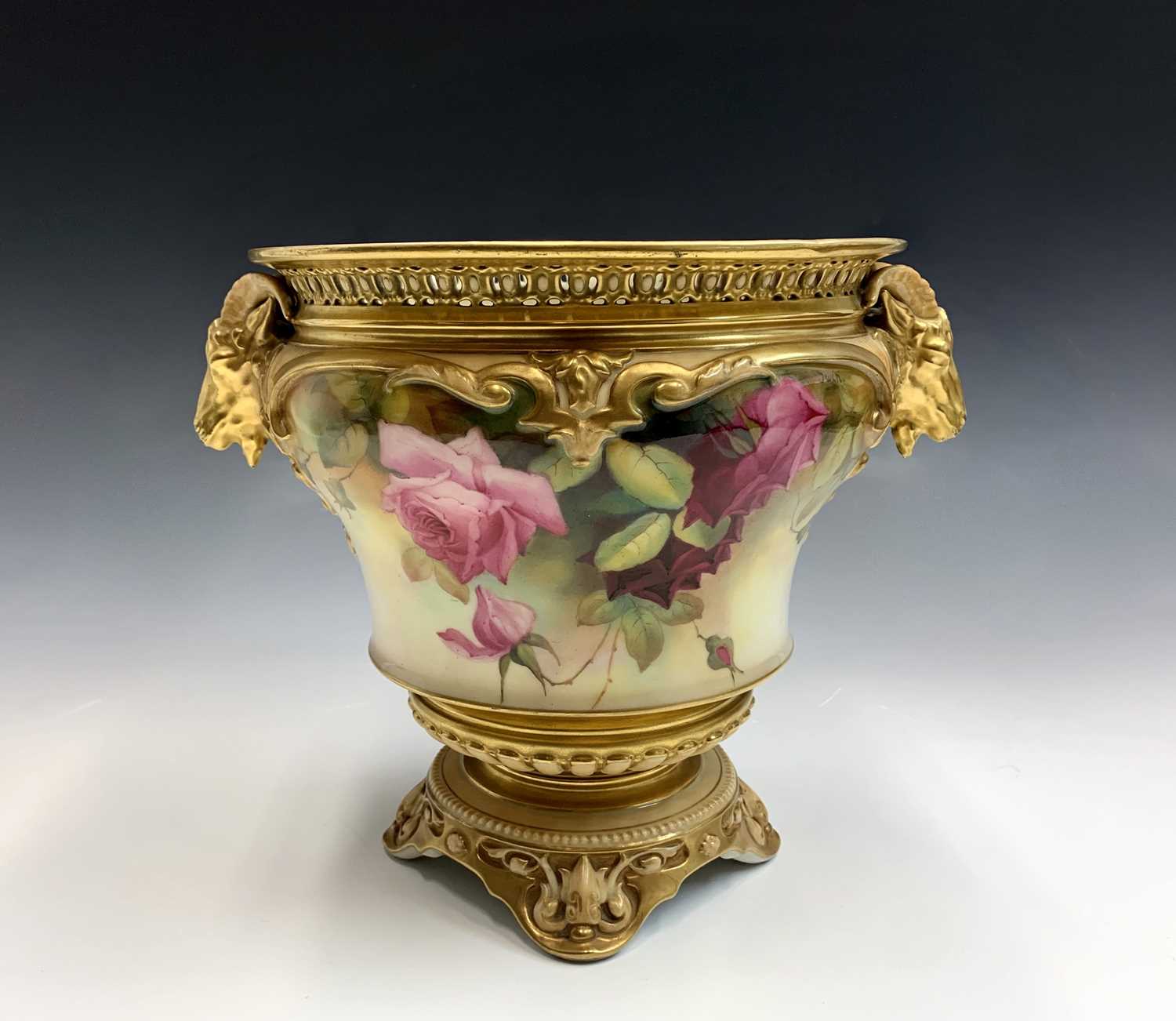 Lot 808 - A Royal Worcester blush ivory floral decorated...