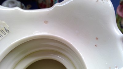 Lot 808 - A Royal Worcester blush ivory floral decorated...
