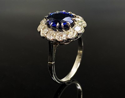 Lot 341 - An impressive sapphire and diamond oval...