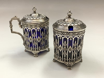 Lot 14 - A pair of French silver pierced and embossed...