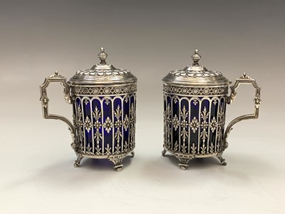 Lot 14 - A pair of French silver pierced and embossed...