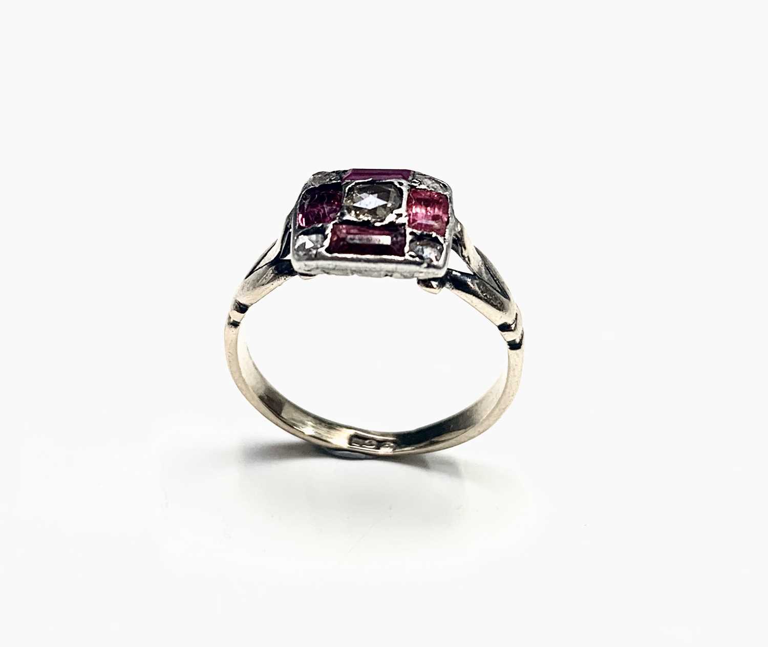 Lot 507 - A 9ct Art Deco ring set in a square with old...