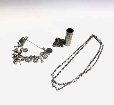 Lot 514 - A silver-coloured charm bracelet, silver...