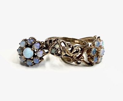 Lot 643 - Three Victorian-style opal set 9ct gold rings...