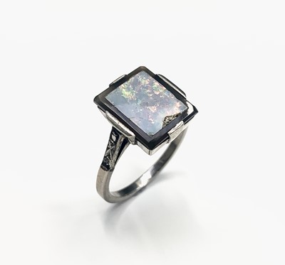 Lot 345 - An art deco opal veneered white gold ring with...