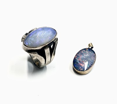 Lot 611 - A gold-mounted opal pendant 18.6mm and a heavy...