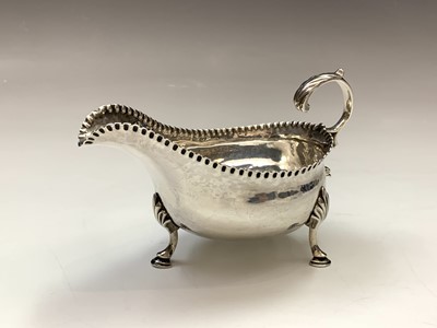 Lot 74 - A George III silver sauce boat by William...