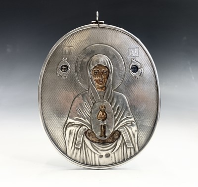 Lot 78 - A Russian silver oval icon 130 x 110mm