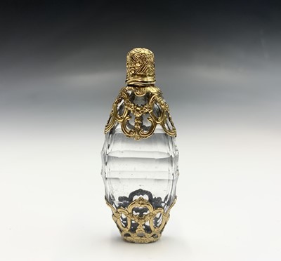 Lot 332 - An exquisite gold caged oval cut glass scent...