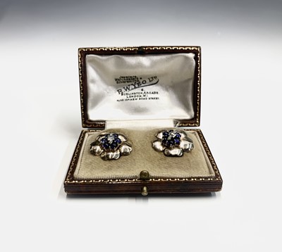 Lot 416 - A pair of gold flowerhead clip-on earrings...