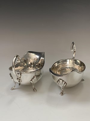 Lot 176 - An Art Nouveau EPBM jug a silver egg cup a...