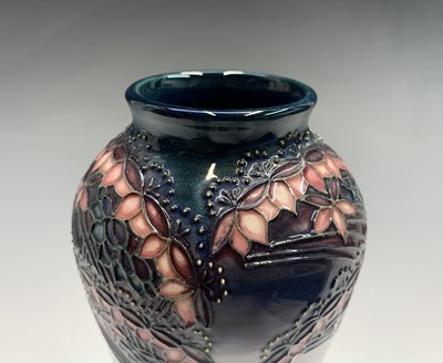 Lot 833 - A Moorcroft 'Gypsy' pattern baluster vase,...