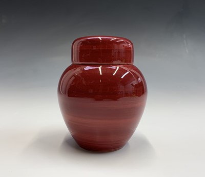 Lot 831 - A Moorcroft red glazed ginger jar, impressed...