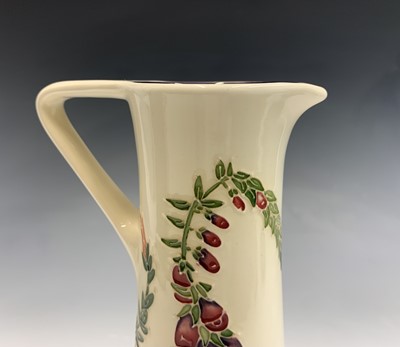 Lot 837 - A Moorcroft 'Amberwood' pattern jug, designed...