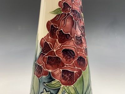 Lot 837 - A Moorcroft 'Amberwood' pattern jug, designed...