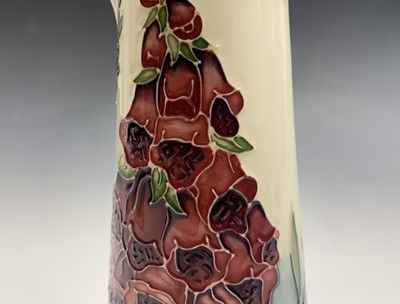 Lot 837 - A Moorcroft 'Amberwood' pattern jug, designed...