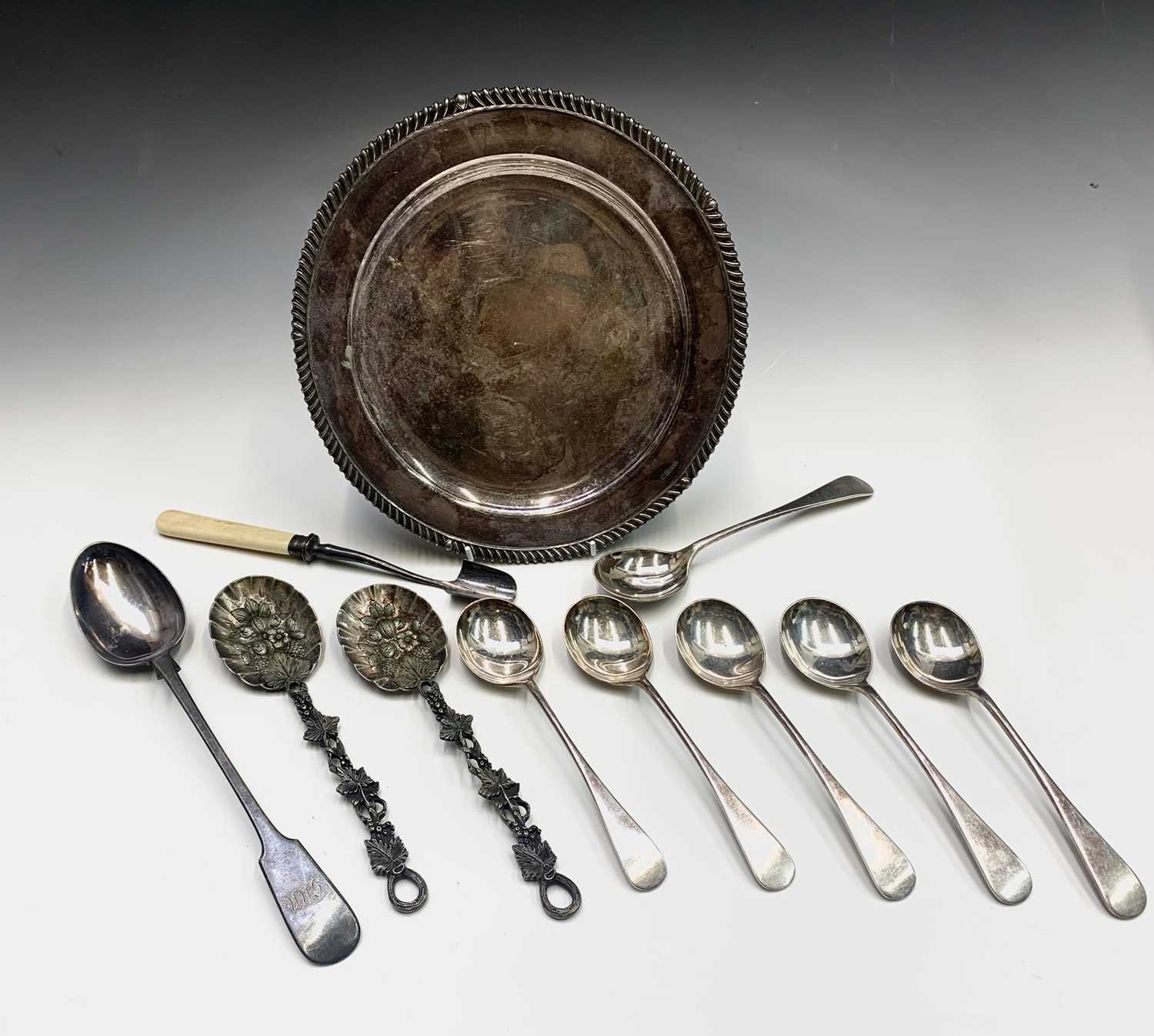 Lot 142 - Two George III silver sauce ladles, one is...