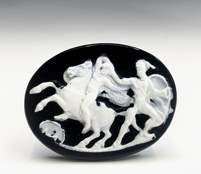 Lot 552 - Black and white glass overlay cameo, 57 x 43mm.