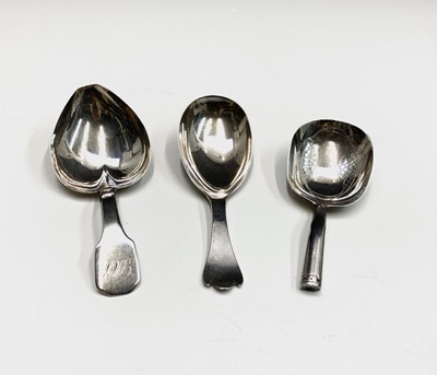 Lot 132 - Three silver caddy spoons 28gm
