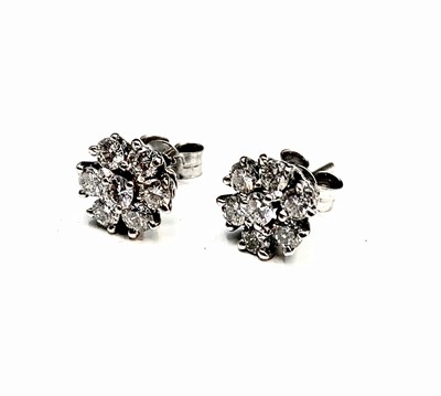 Lot 526 - A pair of 18ct white gold diamond cluster...