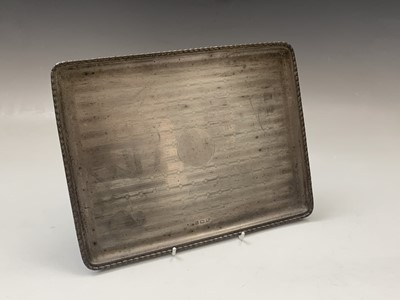 Lot 95 - An engine-turned silver rectangular dressing...