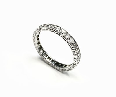 Lot 491 - A diamond set eternity ring, ring size L 1/2.