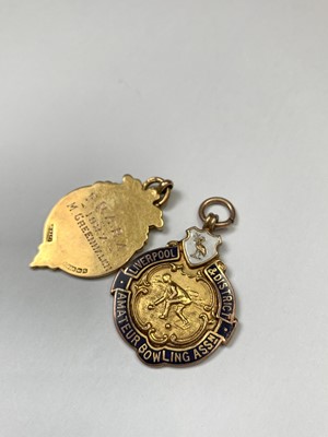 Lot 706 - Two 9ct gold sporting fobs 12.8gm ( one...