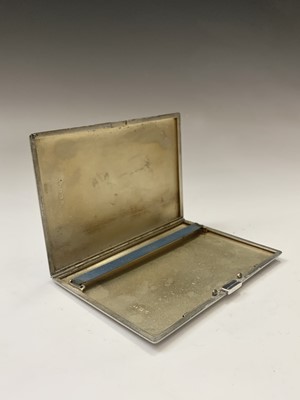 Lot 1083 - A heavy engine-turned silver cigarette case...