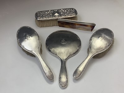 Lot 61 - A pair of silver-mounted brushes, a matching...