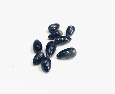 Lot 311 - 9 teardrop sapphire beads, 25g