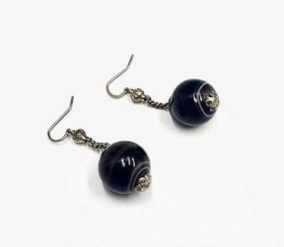 Lot 371 - A pair of spherical banded agate drop earrings.