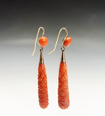 Lot 446 - A pair of gold-mounted carved coral drop...