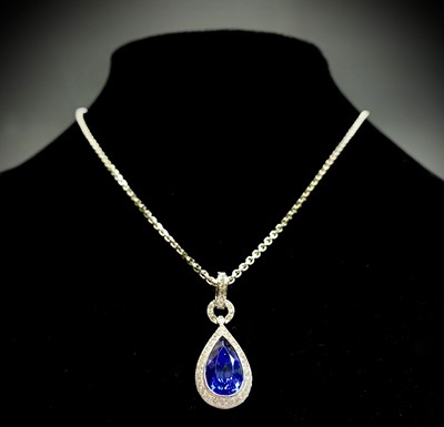 Lot 568 - A fine tanzanite and diamond necklace, the...