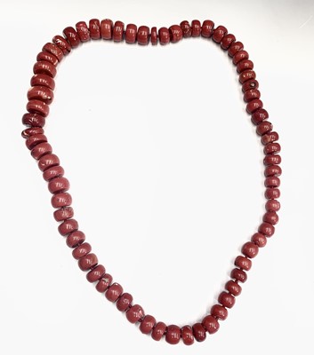 Lot 477 - A substantial graduated red coral bead...