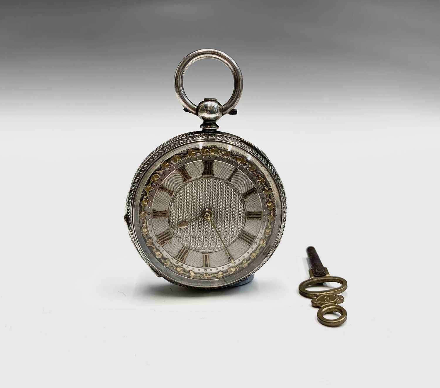 Lot 140 - A Victorian engraved silver keywind fob watch...
