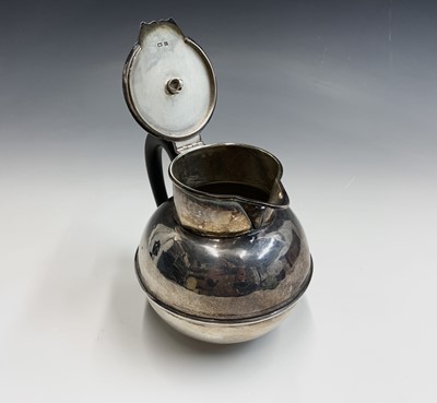 Lot 105 - A Liberty silver hot water jug with globular...