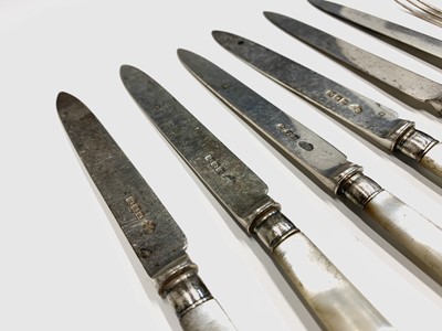 Lot 19 - A set of six dessert knives and forks by...