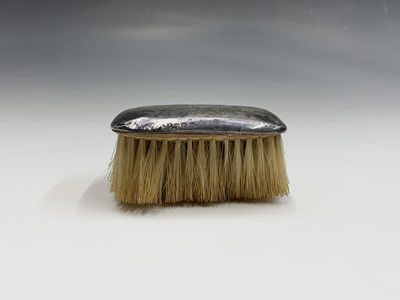 Lot 136 - Two silver-mounted brushes and a...