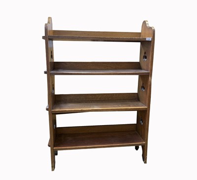 Lot 3104 - An Arts & Crafts oak open bookcase, with three...