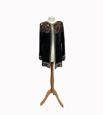 Lot 2815 - A heavily sequinned and beaded jacket, black...