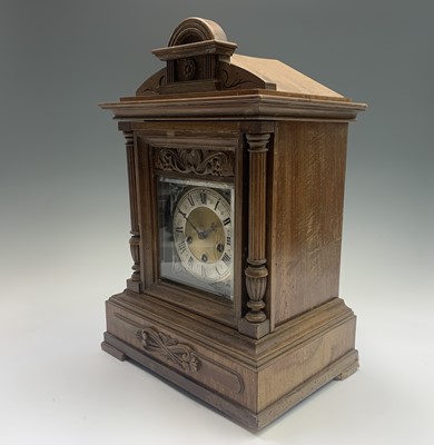 Lot 2930 - A German Junghans musical walnut mantle clock,...