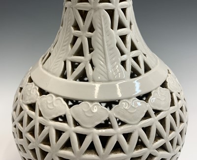 Lot 136 - A Chinese blanc de chine pierced vase, height...